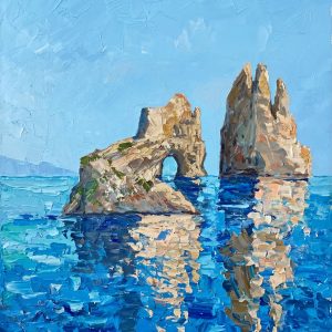 Unframed display of the "Arch of the Azure" expressionistic impasto coastal oil painting. Featuring iconic Mediterranean sea stacks, a natural rock arch, and vibrant blue ocean reflections with heavily layered, hand-applied palette knife textures.