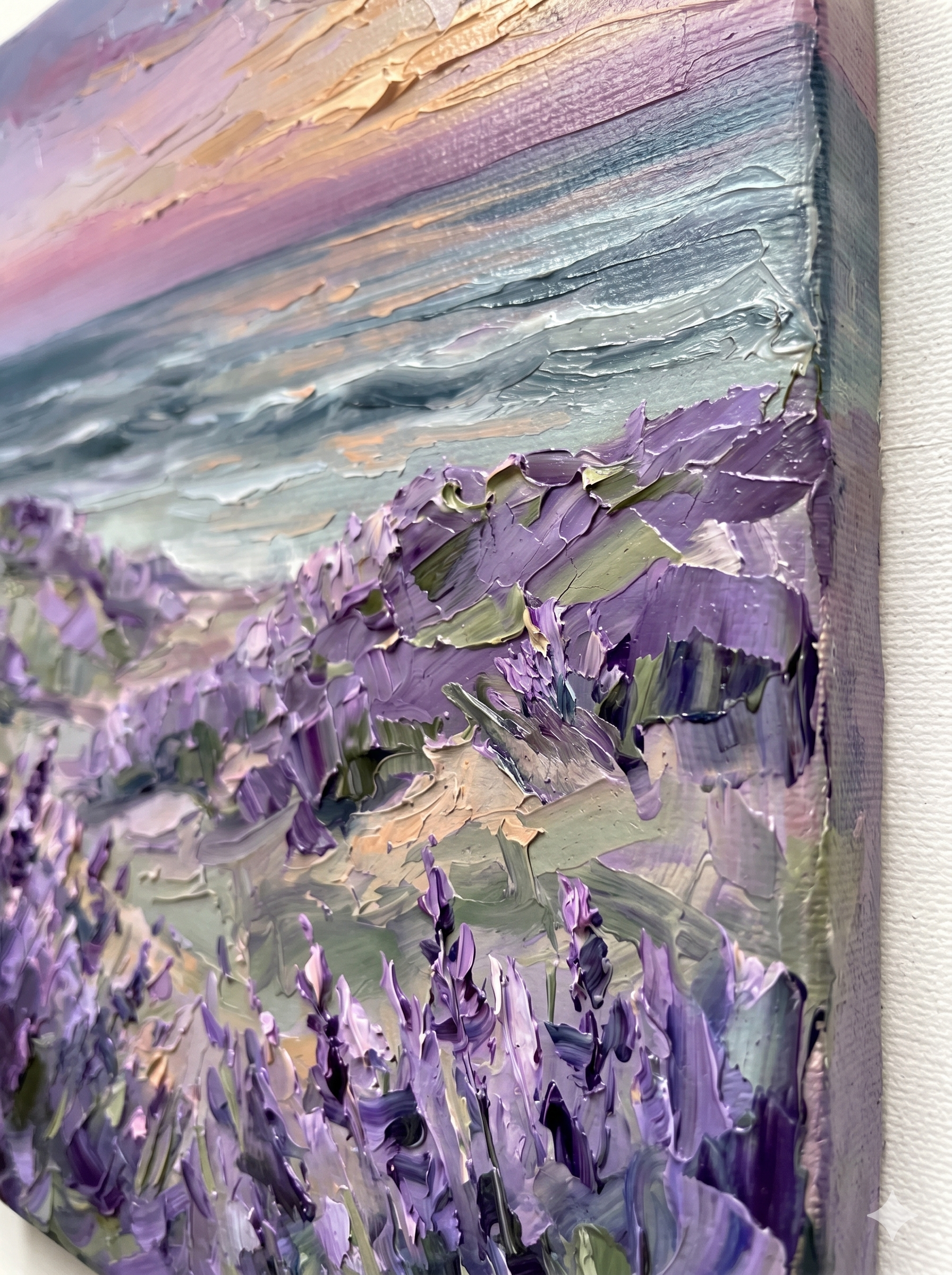 An extreme macro close-up of the "Twilight Lavender Shores" canvas edge. Highlighting the premium hand-embellished mixed media craftsmanship, showcasing the dramatic 3D palette knife impasto textures on the purple coastal flowers.