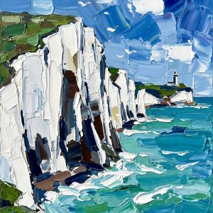 Unframed display of the "Azure Cliffside Beacon" hand-embellished impasto wall art. A majestic coastal landscape featuring dramatic white chalk cliffs, a distant lighthouse, crashing turquoise ocean waves, and dynamic clouds, all created with thick 3D palette knife textures. Shipped securely rolled in a tube without a frame.